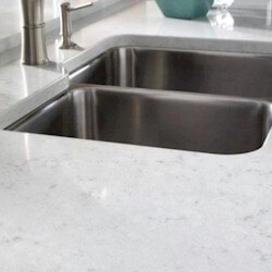 Silestone Quartz Radiant bright-white background with faint grey veining kitchen countertop.