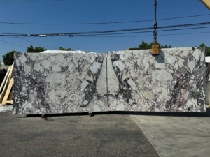 Calacatta Viola Calacatta Viola – Distinctive white marble with bold violet and burgundy veining; a rare and artistic stone.