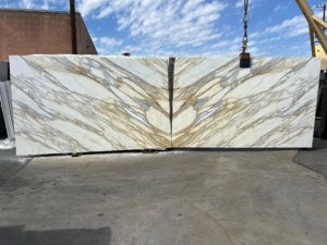 Calacatta Borghini Calacatta Borghini – Iconic Italian marble with creamy white background and dramatic gold and gray veining; a designer favorite.