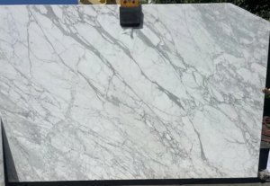 CALACATTA GOLD HONED Calacatta Gold Honed – Honed marble featuring warm gold and soft gray veining; understated, modern luxury.