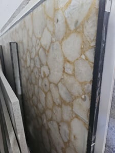 Translucent pale yellow base, subtle banding and crystalline structure — can be backlit to create a glowing effect