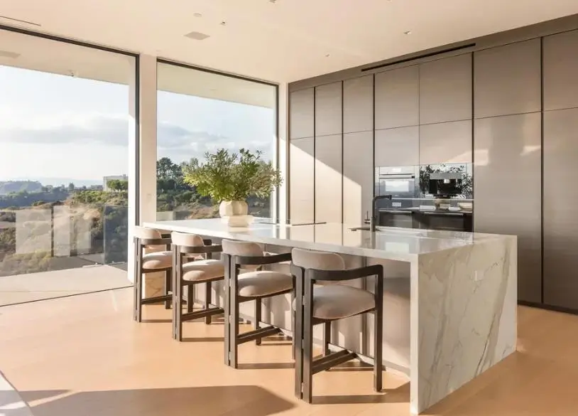 White marble waterfall island White marble waterfall island